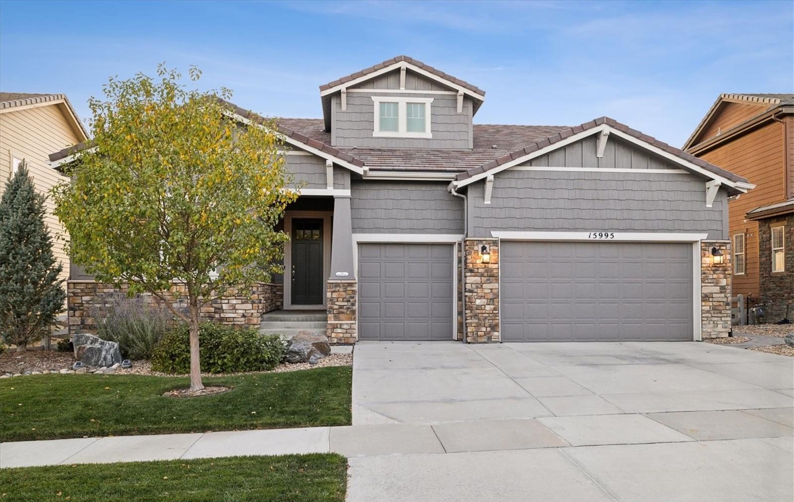 Craftsman home with two garages in Anthem Highlands.