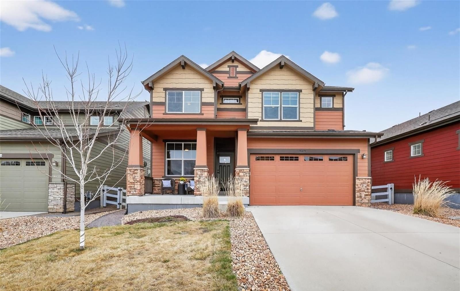 Craftsman two-story home with a front porch in Anthem Highlands.