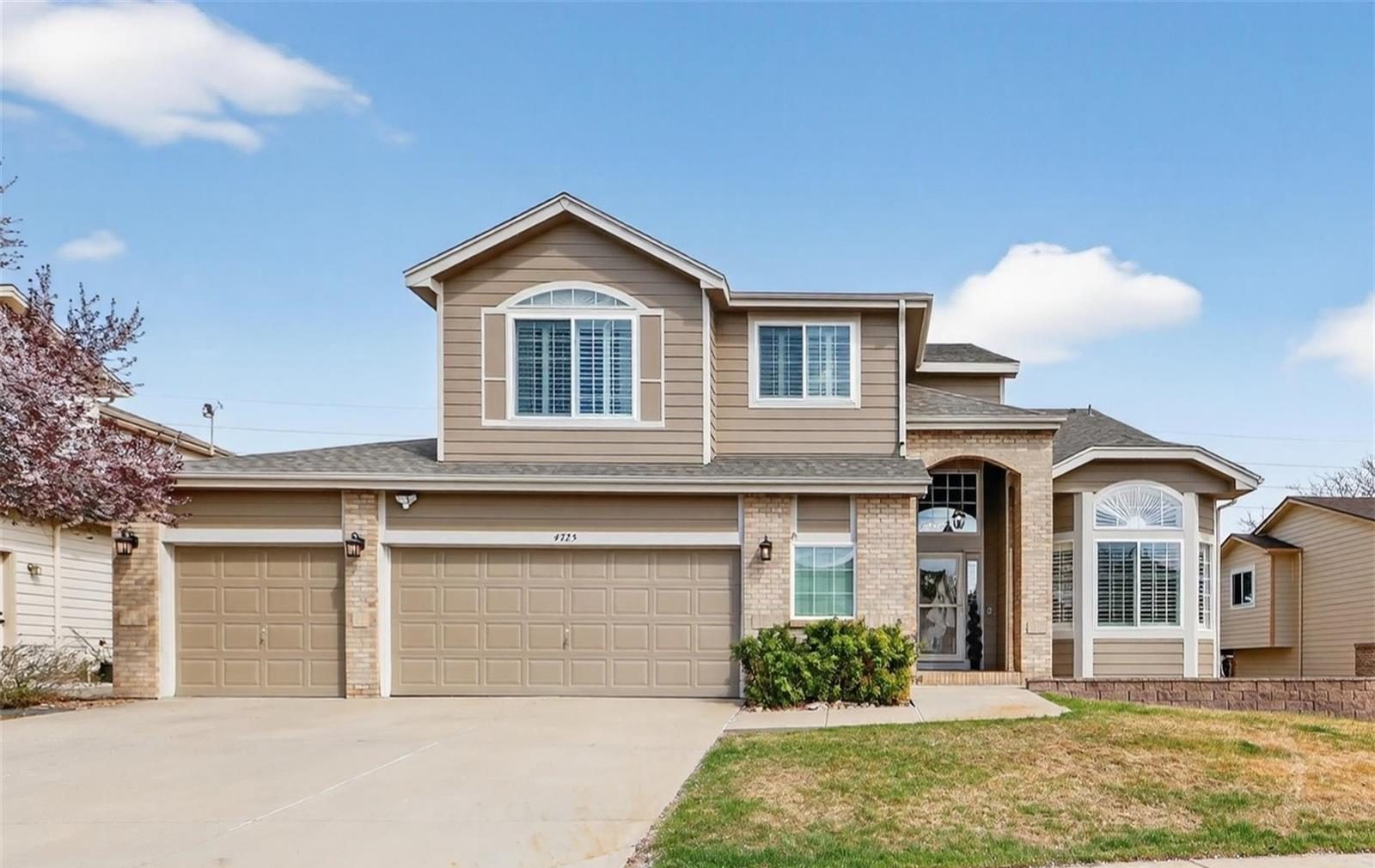 Two-story home with a three-car garage in Broomfield.