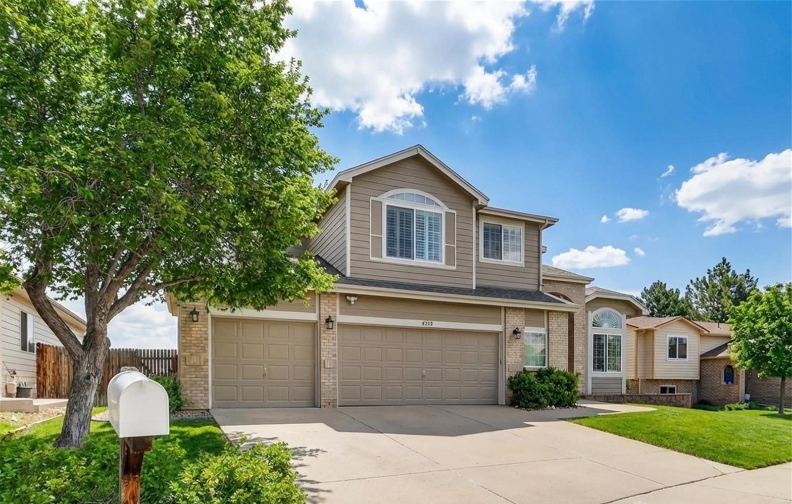 Two-story home with a three-car garage in Broomfield.