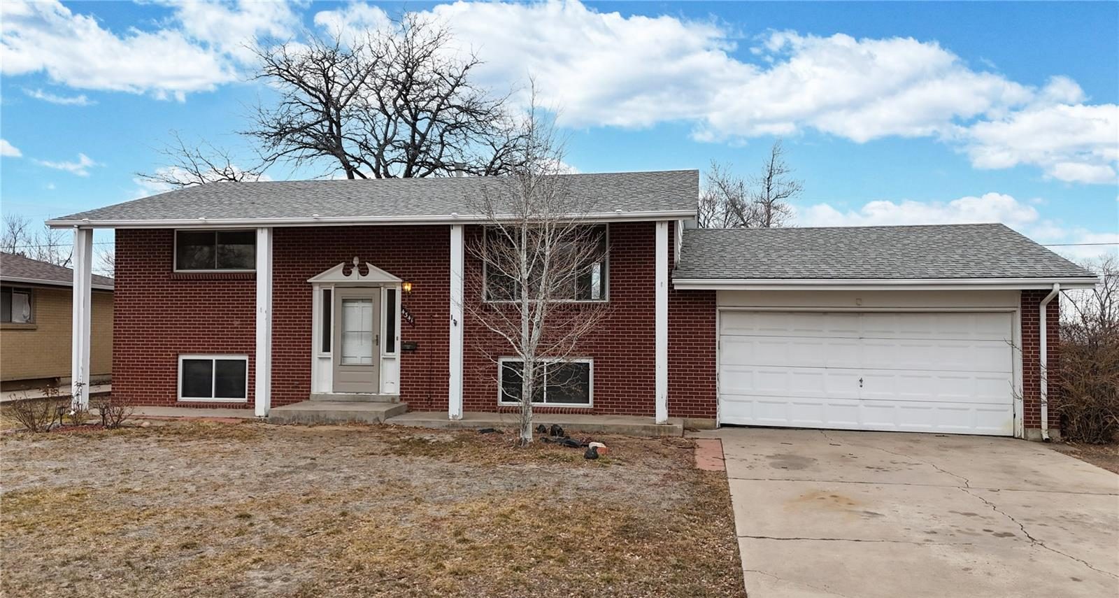 Red-brick bi-level home in southwest Denver.