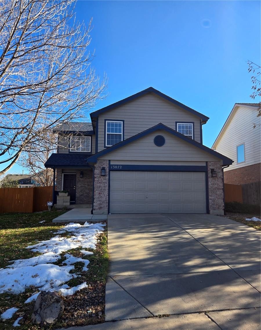 Two-story home with a two-car garage in Thornton.