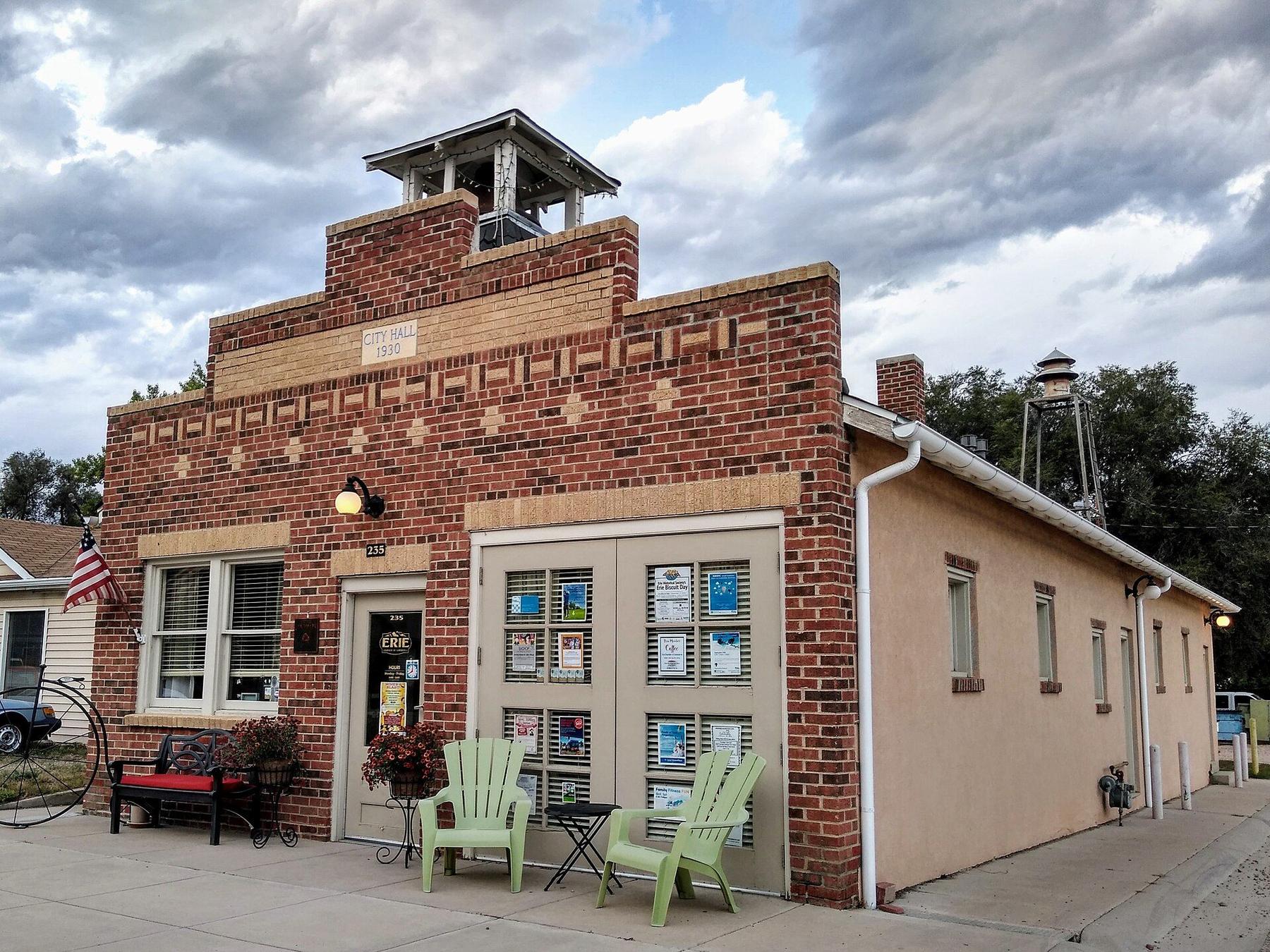 Old Erie City Hall, a small brick building with a bell tower.