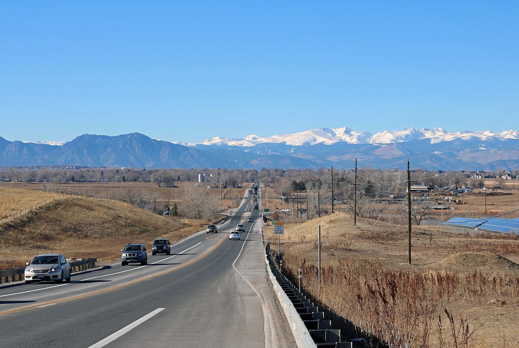 Baseline Road in Boulder County with snowy mountains ahead.