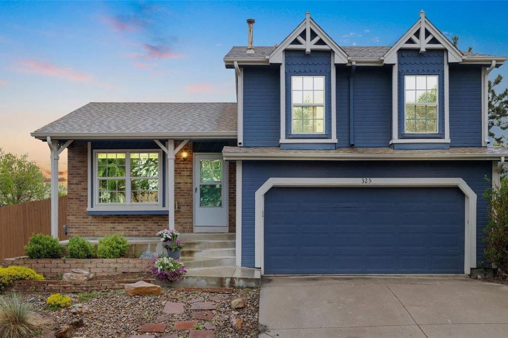 A two-story home in Greenway Park at dusk.