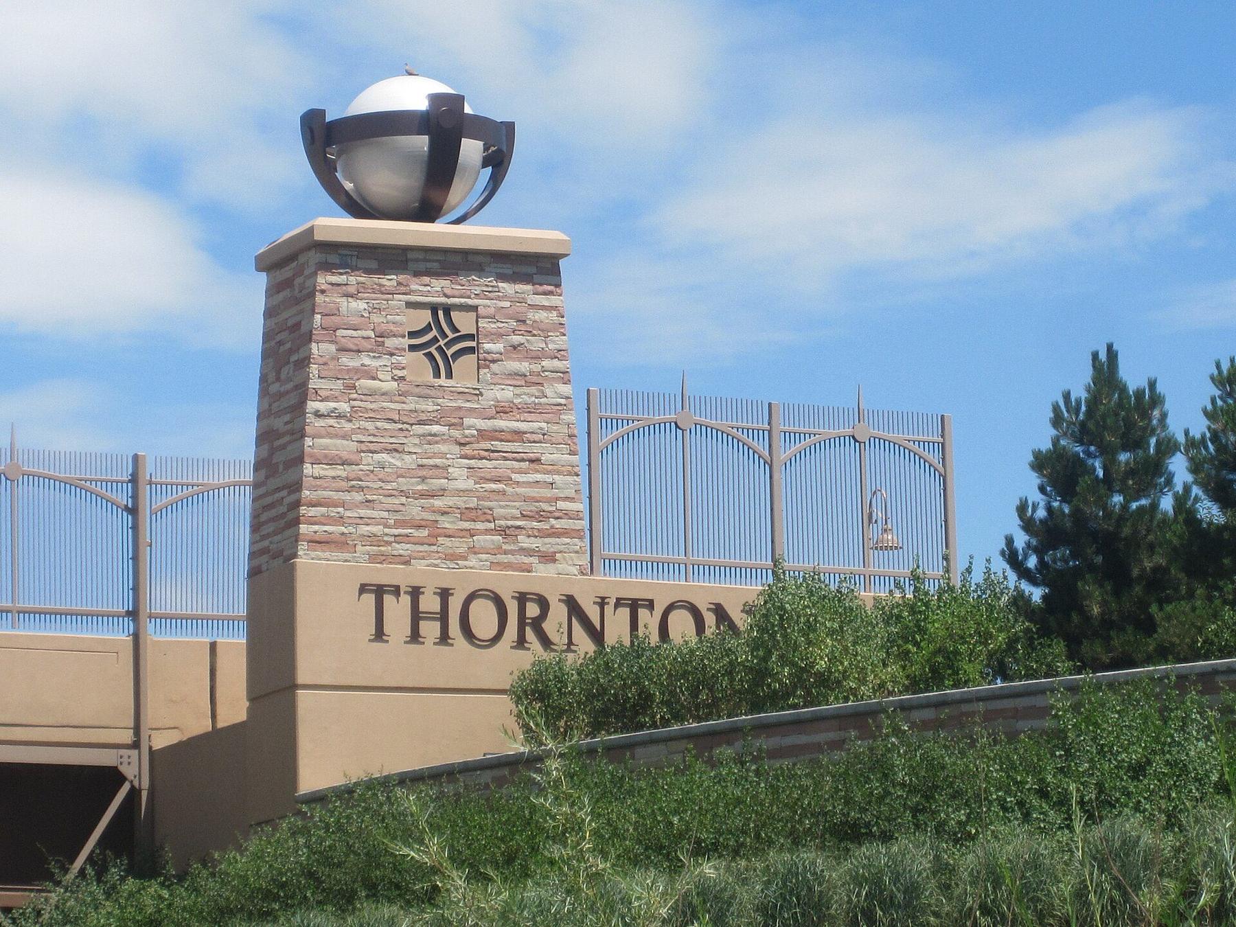 Stone welcome monument at the edge of Thornton.