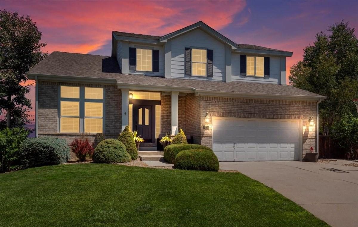 Two-story home in Westminster at twilight.